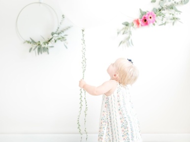 child playing with balloon