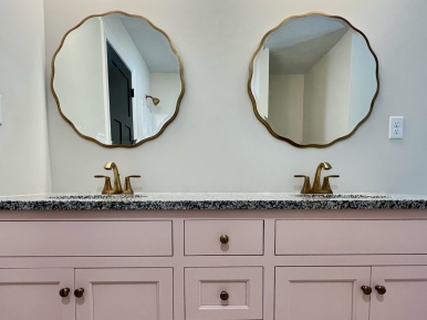 Bathroom mirrors with pink vanity sink