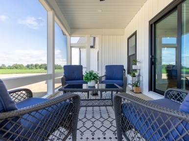 A screened in porch at the 2023 parade home