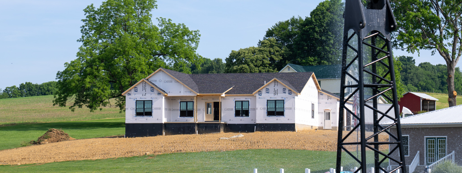 House under construction by Capstone Custom Homes