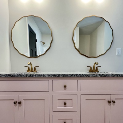 Bathroom mirrors with pink vanity sink