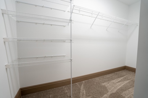 a closet by Capstone Custom Homes