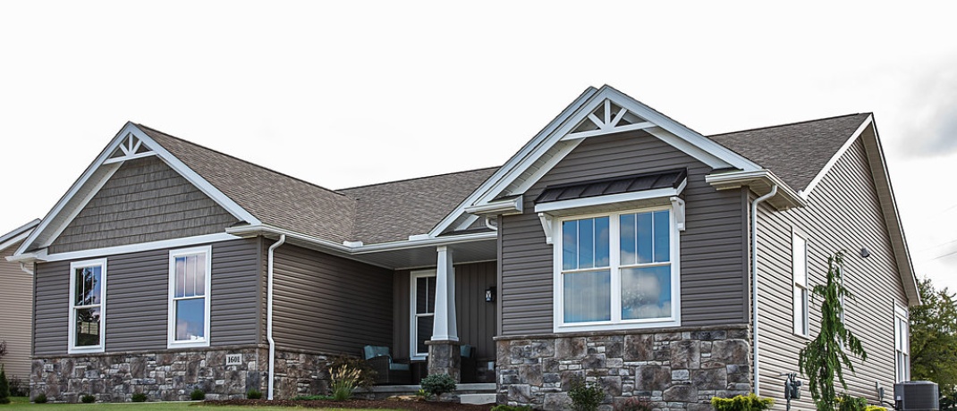 Provia Vinyl Siding with Capstone Signature Windows Custom Home Exterior